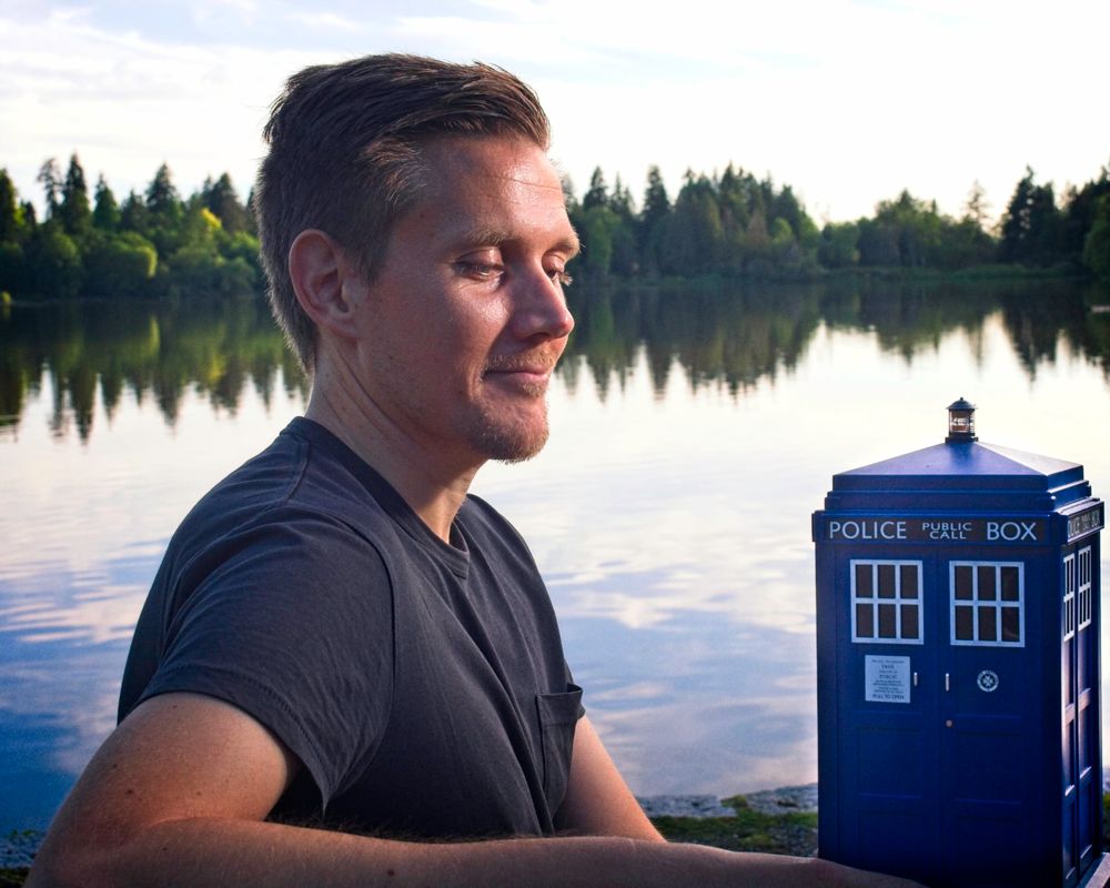 A portrait of Paul with the Tardis